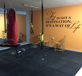 מדבקת קיר לחדר כושר - fit is not a destination