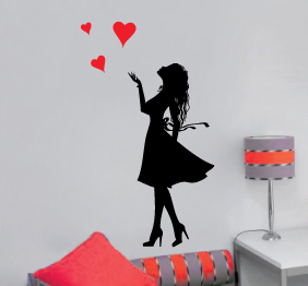 מדבקת קיר - נערה מפזרת לבבות